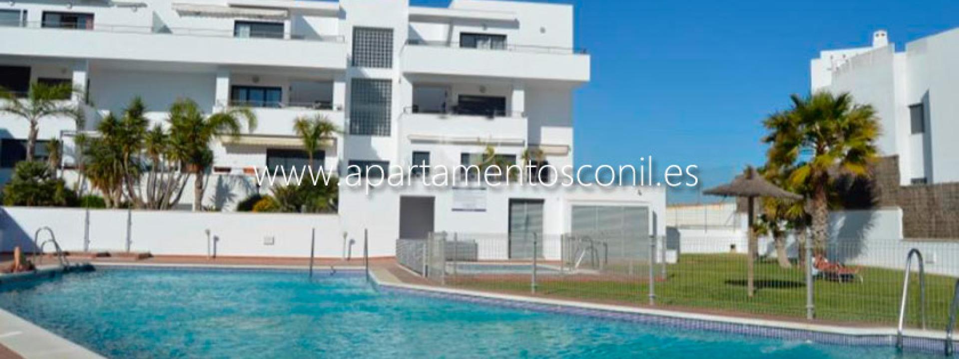 APARTAMENTOS TURÍSTICOS CONIL LUZ foto piscina fuente web alojamiento